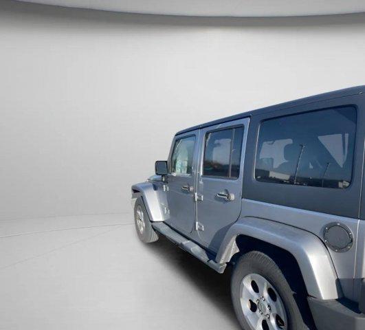 used 2013 Jeep Wrangler Unlimited car, priced at $13,995