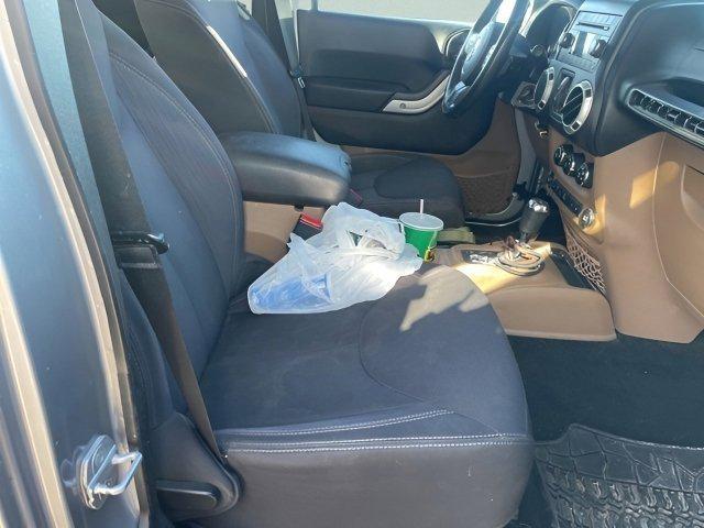 used 2013 Jeep Wrangler Unlimited car, priced at $13,995