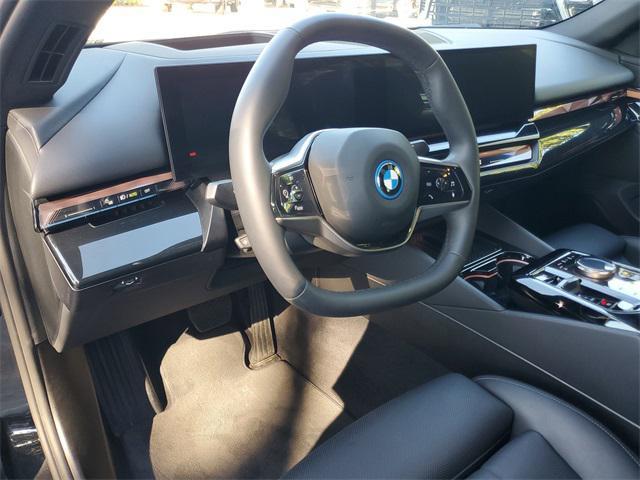 used 2024 BMW i5 car, priced at $37,995