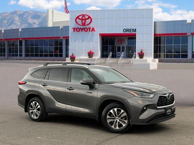 used 2021 Toyota Highlander Hybrid car, priced at $30,412