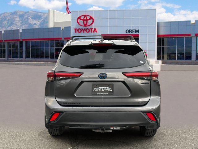 used 2021 Toyota Highlander Hybrid car, priced at $30,412