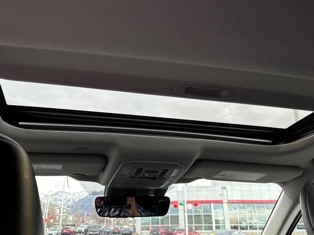 used 2021 Toyota Highlander Hybrid car, priced at $30,412