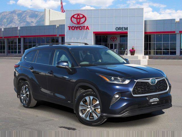 used 2021 Toyota Highlander Hybrid car, priced at $24,645