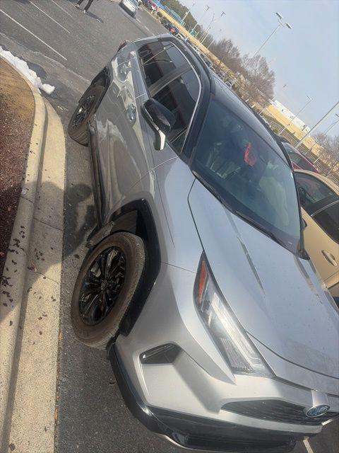 used 2024 Toyota RAV4 Hybrid car, priced at $35,976
