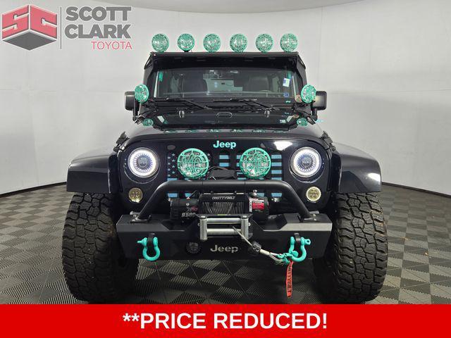 used 2015 Jeep Wrangler Unlimited car, priced at $19,834