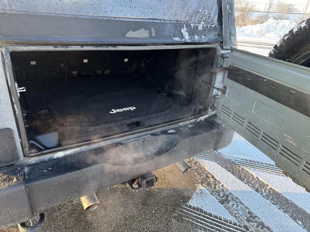 used 2015 Jeep Wrangler Unlimited car, priced at $12,989