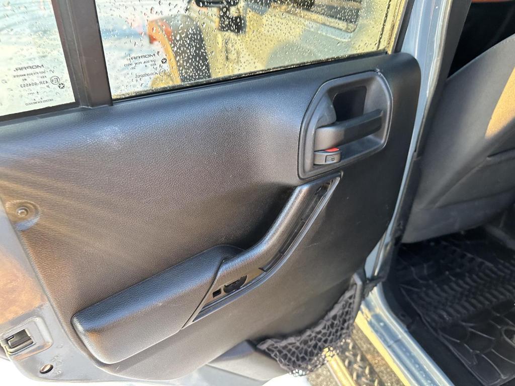 used 2015 Jeep Wrangler Unlimited car, priced at $12,989