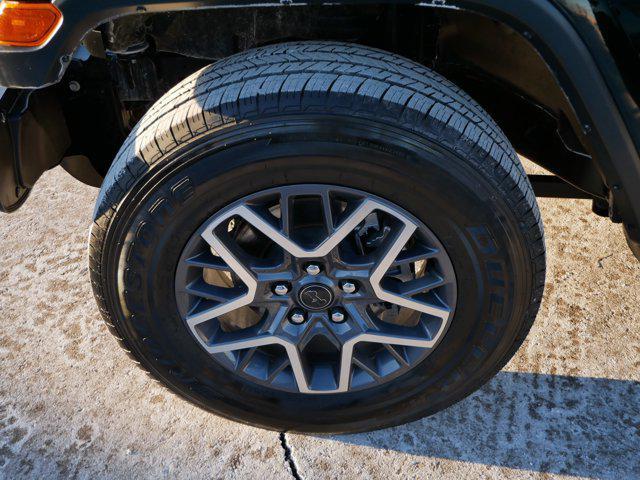 used 2024 Jeep Wrangler car, priced at $40,398