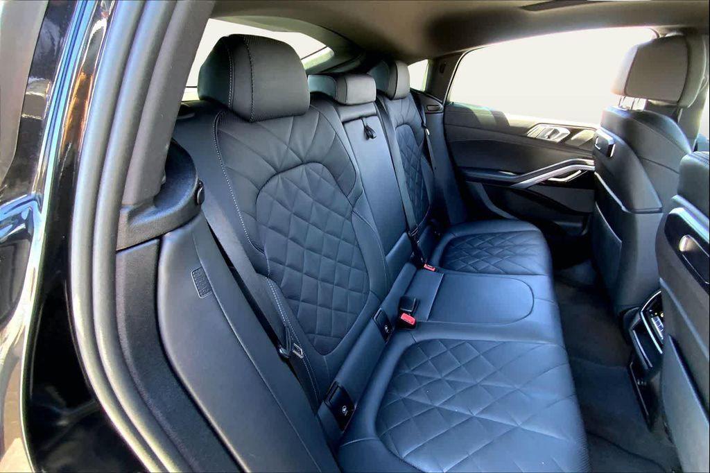used 2025 BMW X6 car, priced at $67,173