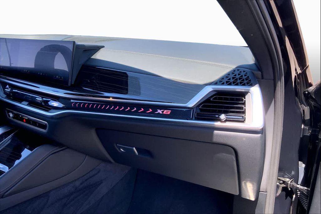 used 2025 BMW X6 car, priced at $67,173