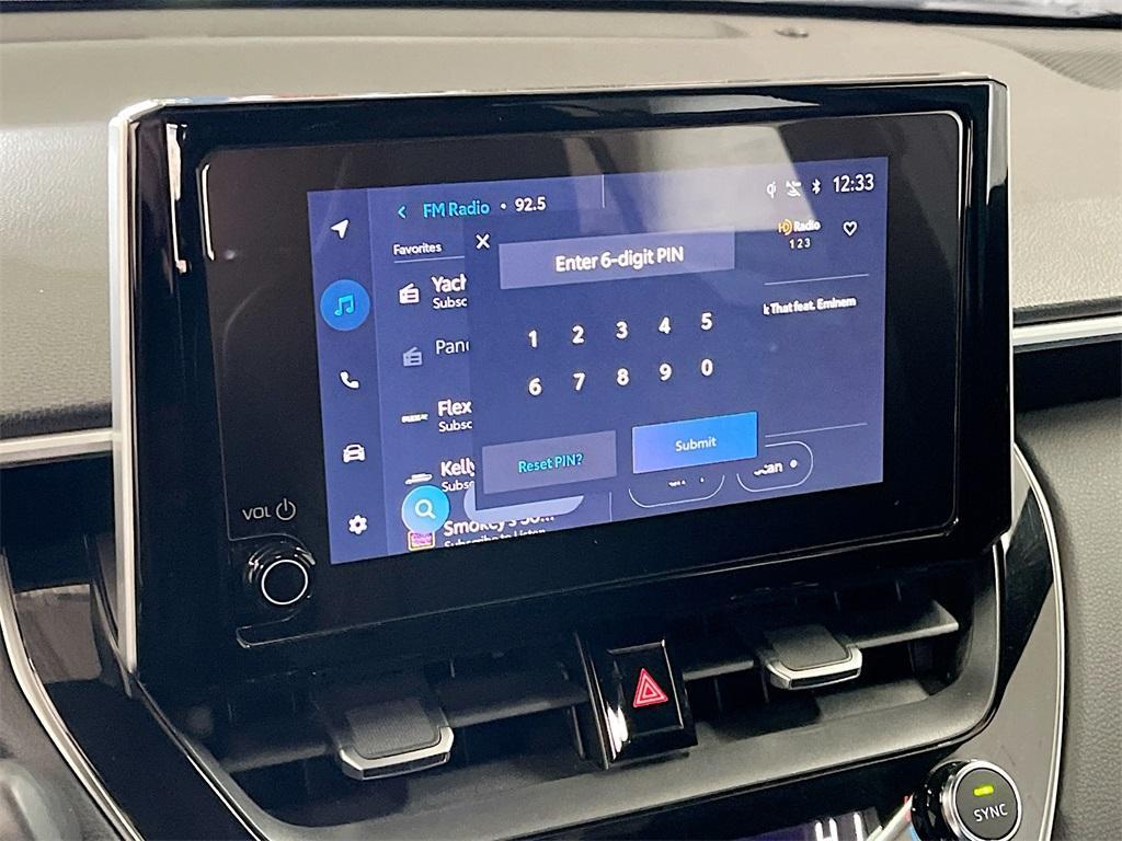 used 2025 Toyota Corolla Cross Hybrid car, priced at $27,900