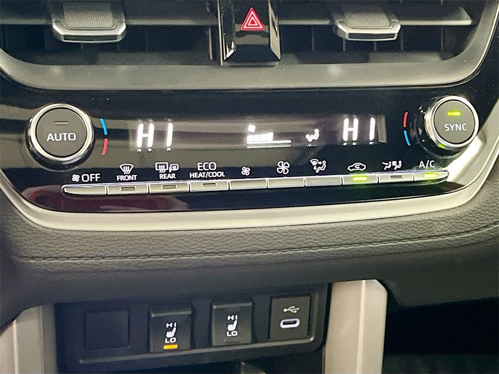 used 2025 Toyota Corolla Cross Hybrid car, priced at $27,900