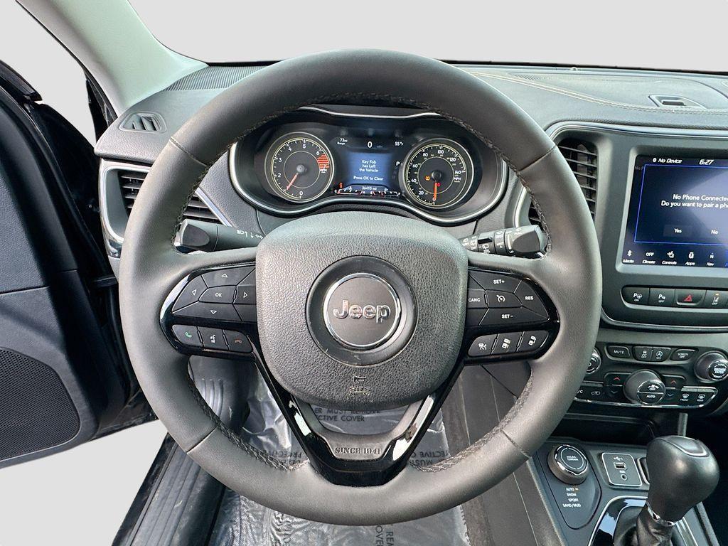 used 2023 Jeep Cherokee car, priced at $16,900