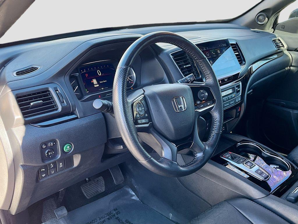 used 2023 Honda Passport car, priced at $27,300