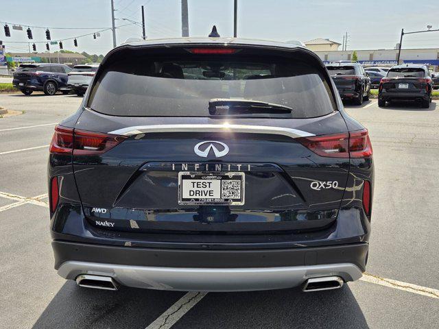 used 2025 INFINITI QX50 car, priced at $36,895