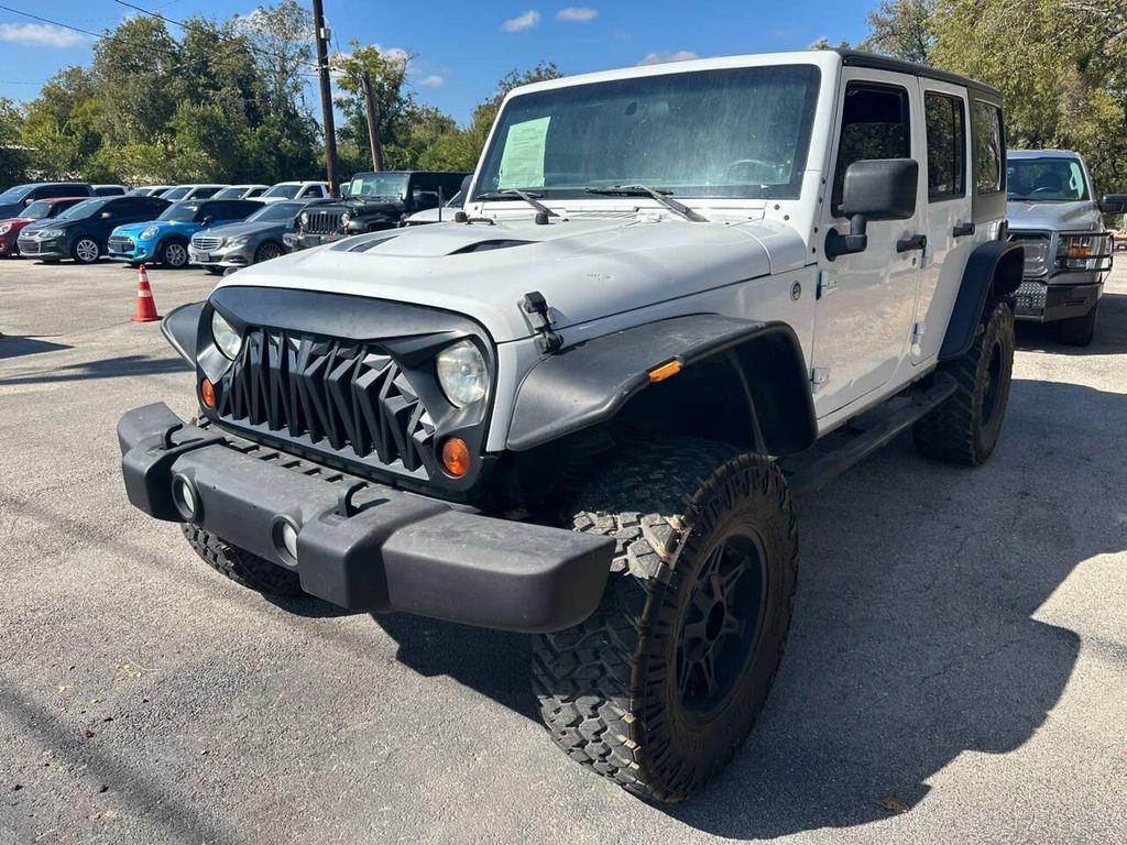 used 2013 Jeep Wrangler Unlimited car, priced at $14,998