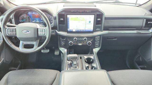 used 2023 Ford F-150 car, priced at $34,028