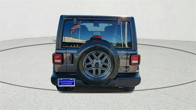 used 2024 Jeep Wrangler car, priced at $29,491