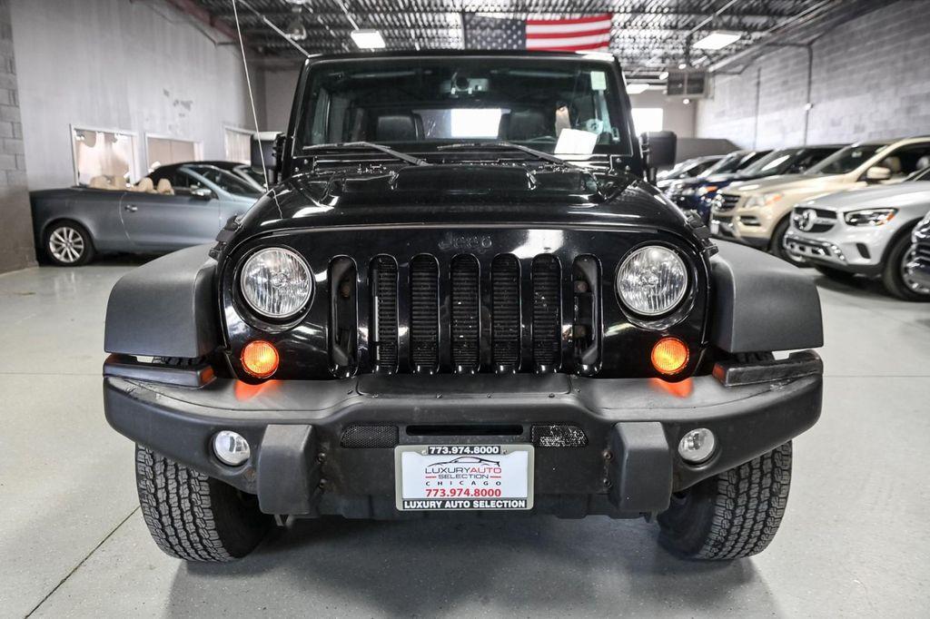 used 2013 Jeep Wrangler Unlimited car, priced at $15,985