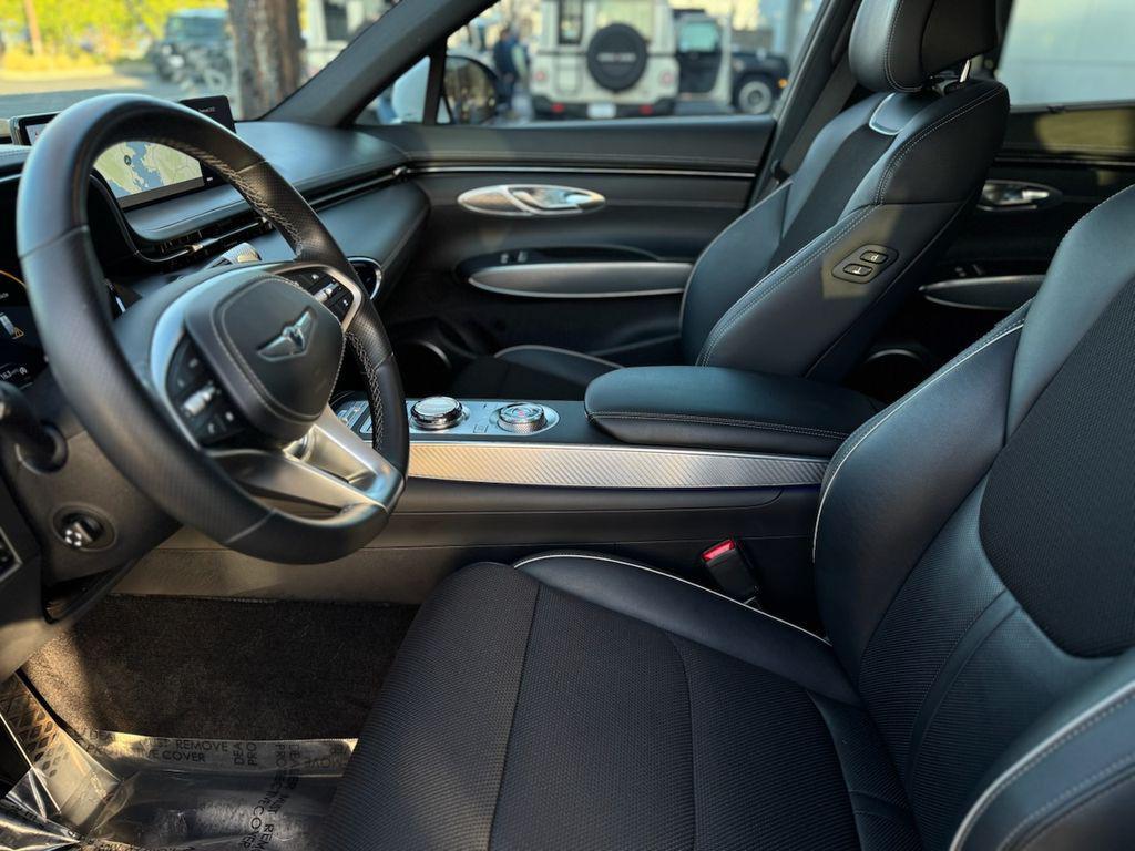 used 2023 Genesis GV70 car, priced at $35,488