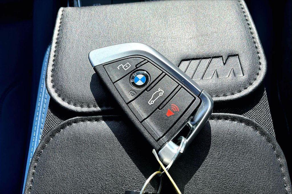 used 2024 BMW M4 car, priced at $71,904