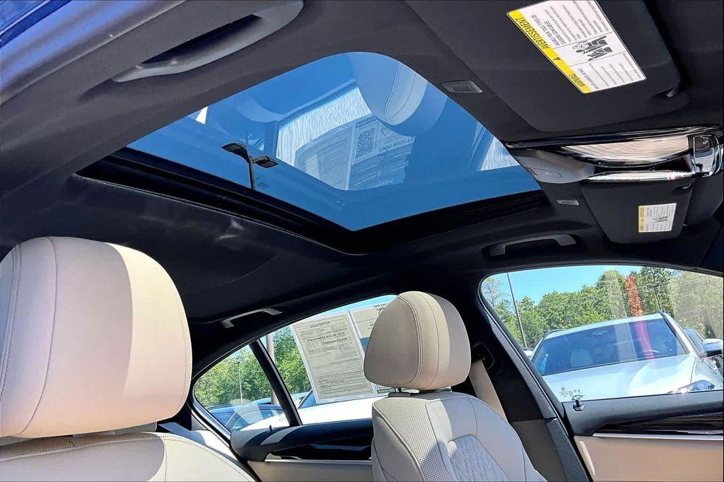 used 2023 BMW 530 car, priced at $39,396