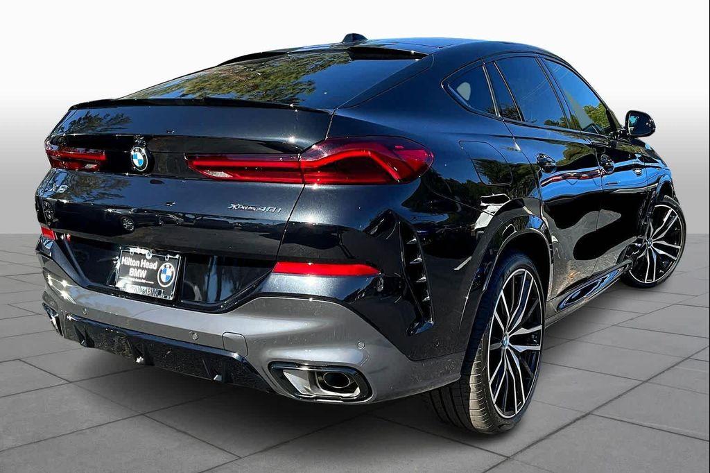 used 2025 BMW X6 car, priced at $72,100
