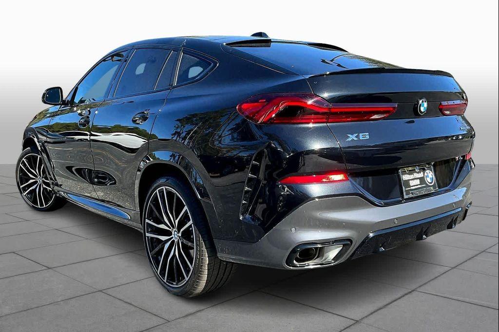 used 2025 BMW X6 car, priced at $72,100