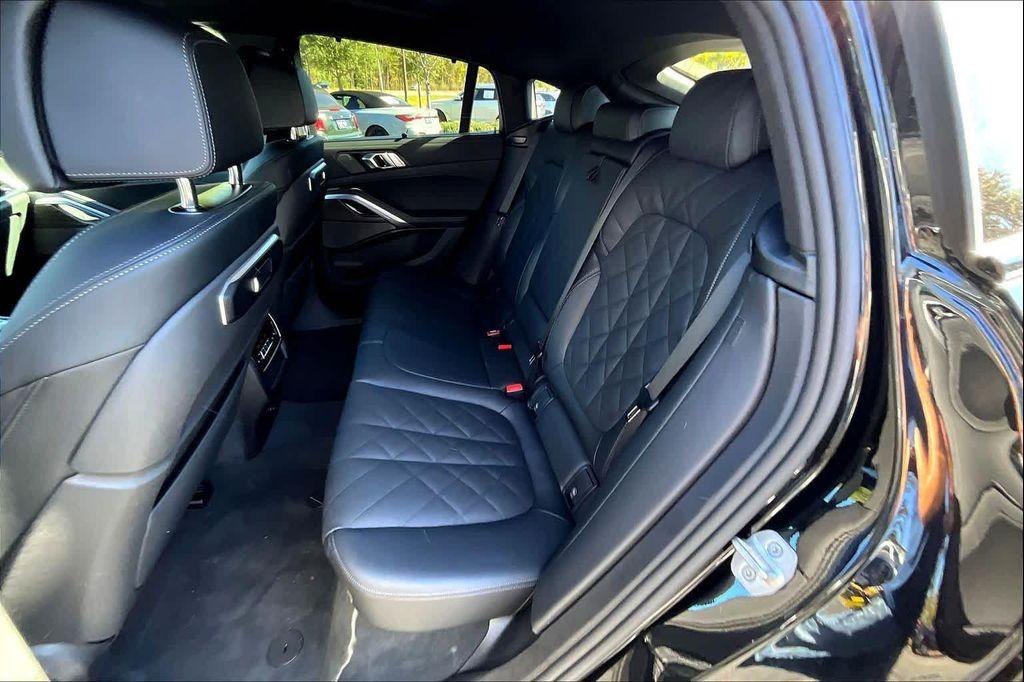 used 2025 BMW X6 car, priced at $72,100