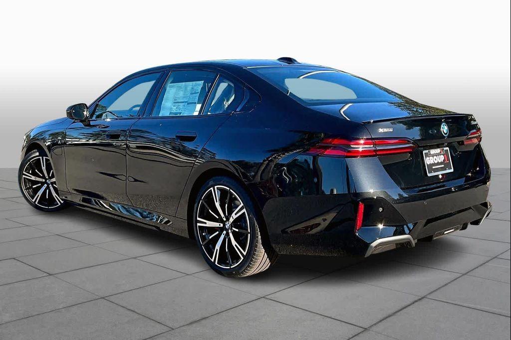new 2026 BMW 550e car, priced at $86,865