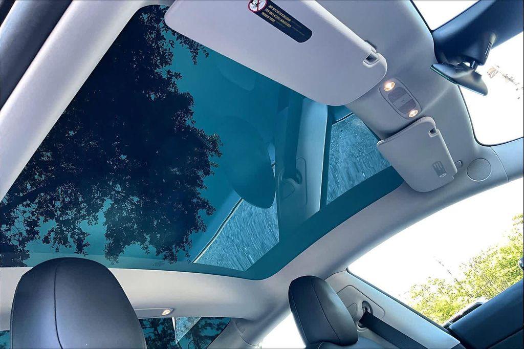 used 2022 Tesla Model 3 car, priced at $30,200