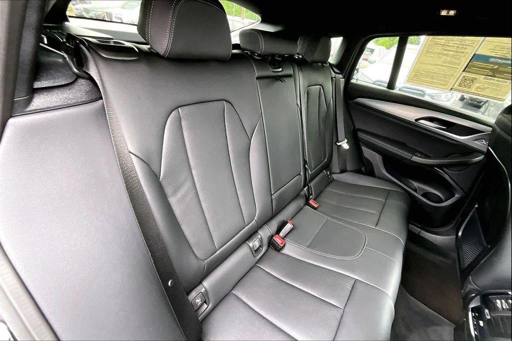 used 2025 BMW X4 car, priced at $52,400