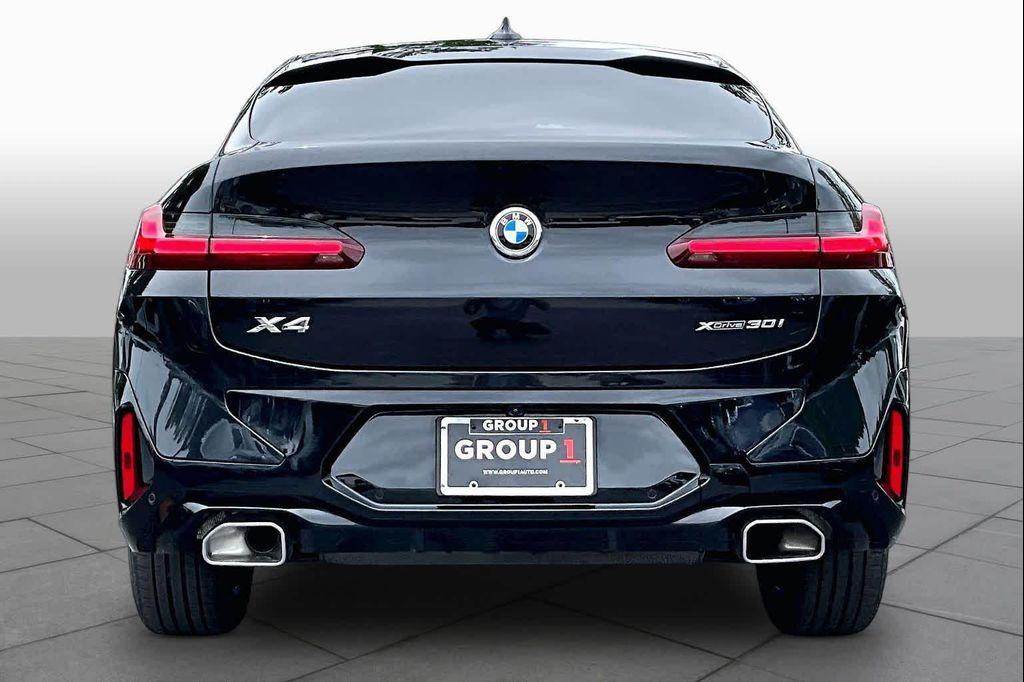 used 2025 BMW X4 car, priced at $52,400
