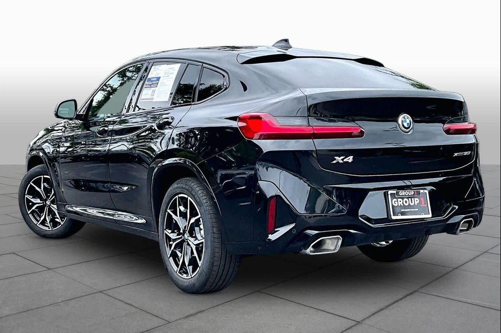 used 2025 BMW X4 car, priced at $52,400