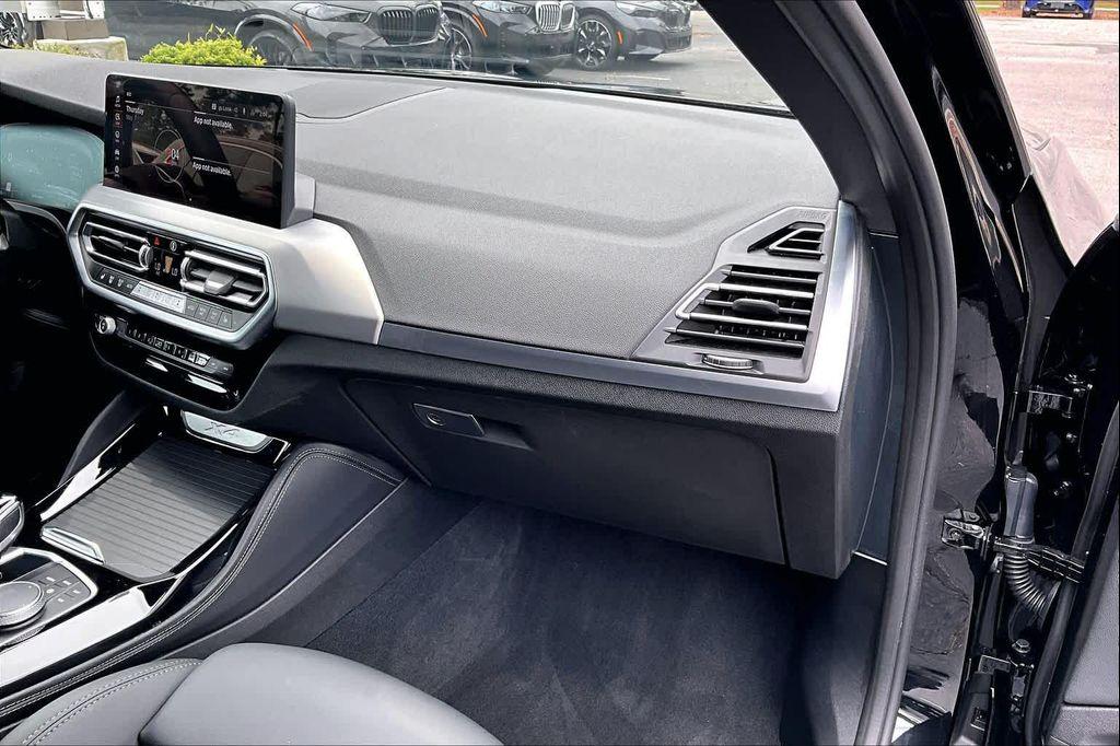used 2025 BMW X4 car, priced at $52,400