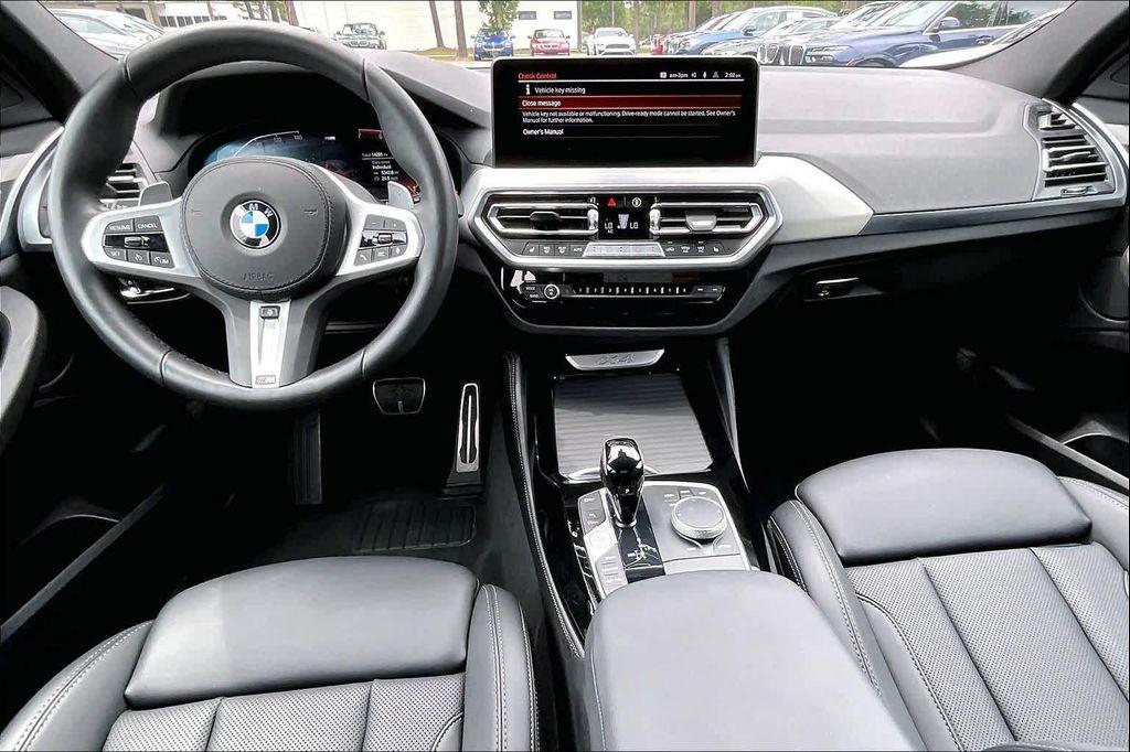 used 2025 BMW X4 car, priced at $52,400