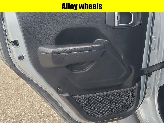 used 2023 Jeep Wrangler 4xe car, priced at $31,273