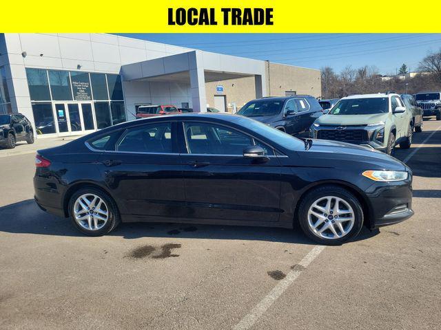 used 2016 Ford Fusion car, priced at $4,995