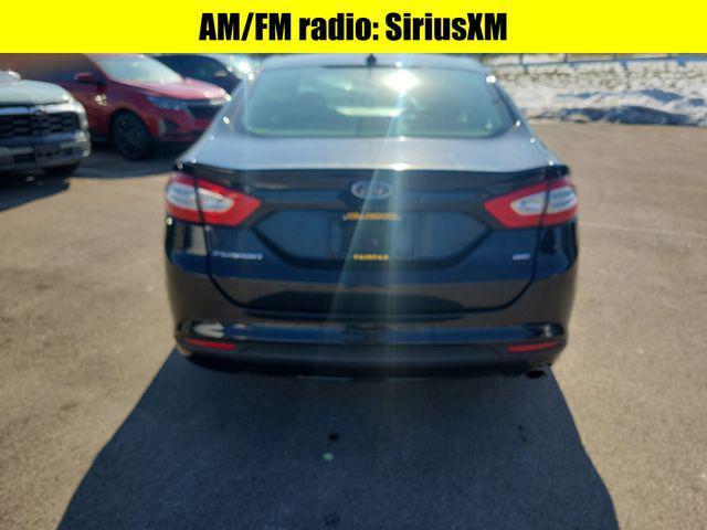 used 2016 Ford Fusion car, priced at $4,995