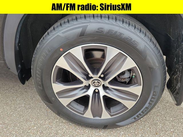 used 2021 Toyota Highlander car, priced at $29,173