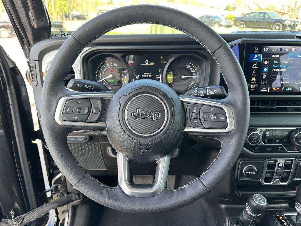 used 2025 Jeep Wrangler 4xe car, priced at $34,273