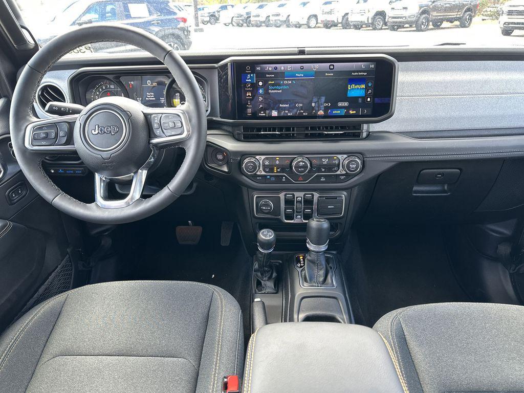 used 2025 Jeep Wrangler 4xe car, priced at $33,804