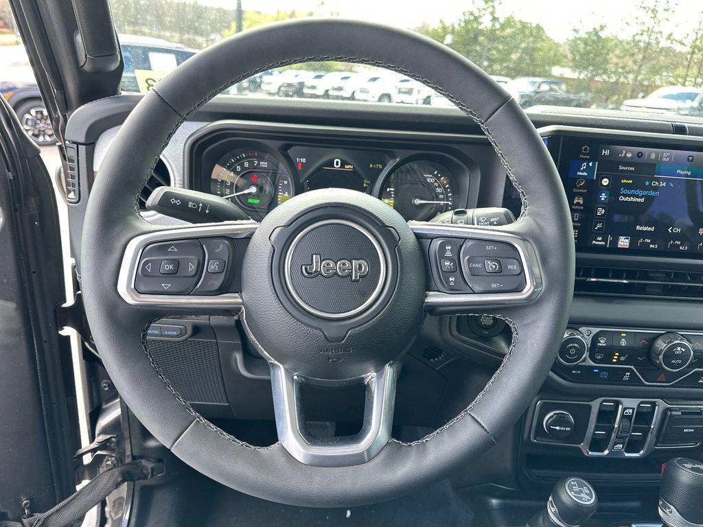 used 2025 Jeep Wrangler 4xe car, priced at $33,804