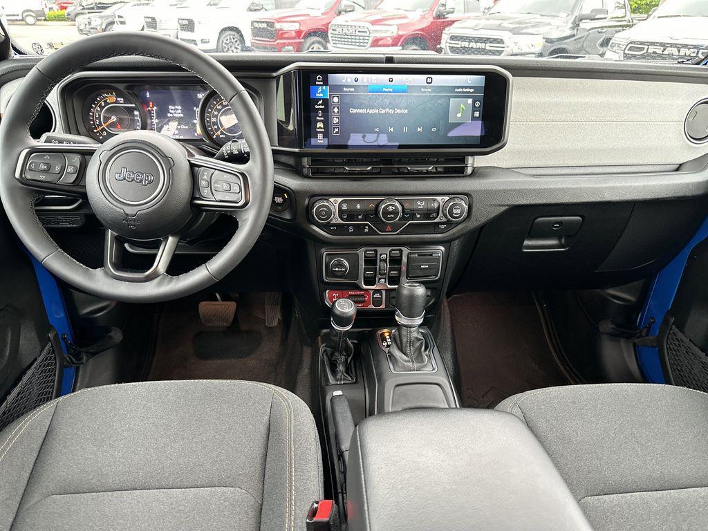 used 2025 Jeep Wrangler car, priced at $39,250