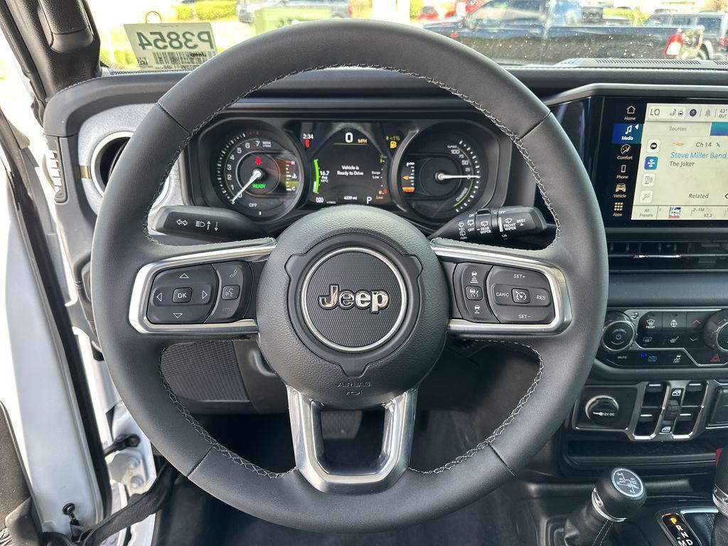 used 2025 Jeep Wrangler 4xe car, priced at $35,147