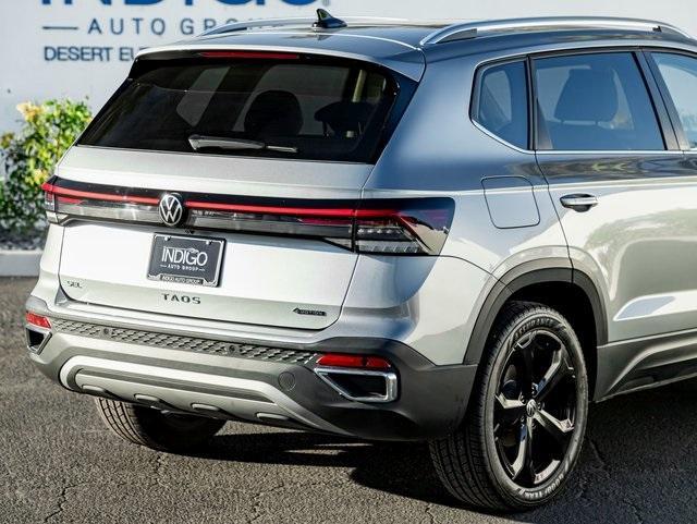 used 2025 Volkswagen Taos car, priced at $29,493