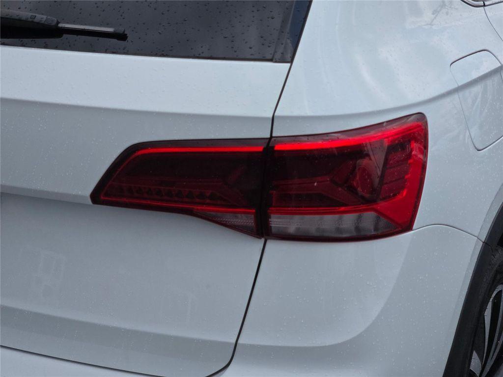 used 2024 Volkswagen Taos car, priced at $22,000