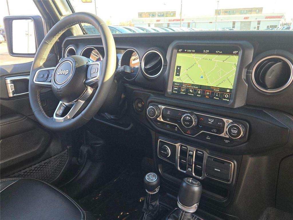 used 2023 Jeep Wrangler 4xe car, priced at $31,943