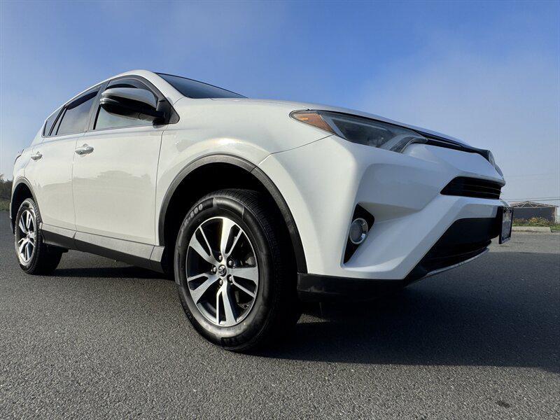 used 2018 Toyota RAV4 car, priced at $17,980