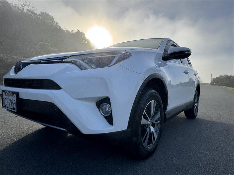 used 2018 Toyota RAV4 car, priced at $17,980